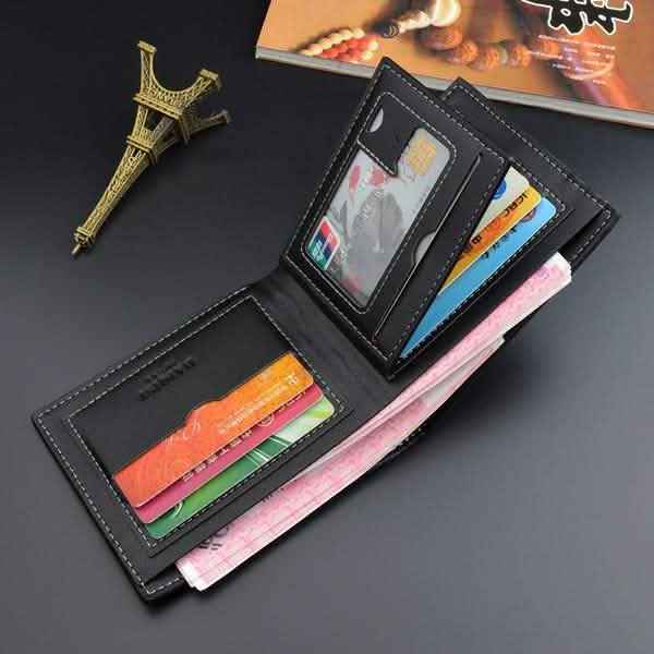 Genuine leather trifold wallet opened, card slots and ID window, dark exterior.