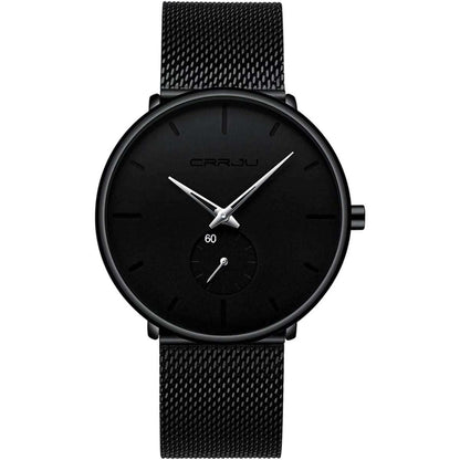 Black round wrist watch with minimalist markers and black mesh strap