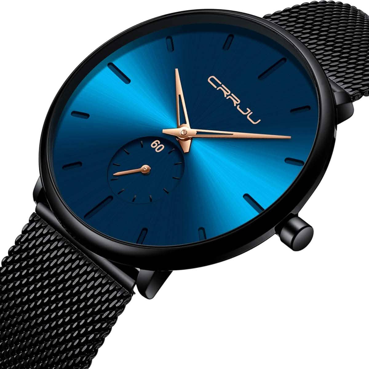Minimalist wrist watch with blue face, black bezel, and black mesh metal band