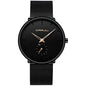 Minimalist black wrist watch with black mesh strap, black dial, gold hands and subdial
