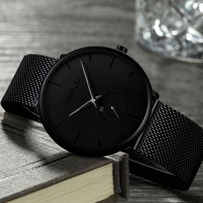 Men's minimalist waterproof wrist watch with black mesh strap and black dial, silver hands