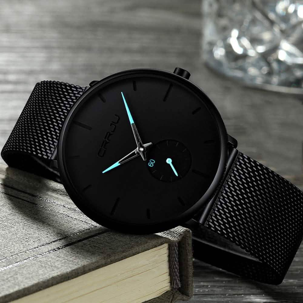 Men's minimalist waterproof wrist watch with black mesh strap and black dial, teal hands