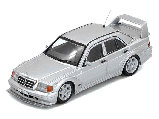 Silver metallic diecast sedan model car, side 3/4 view, chrome grille and alloy wheels