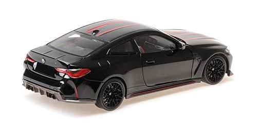 Black die-cast BMW M4 CSL coupe with red stripes, rear 3/4 view