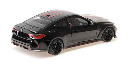 Black die-cast BMW M4 CSL coupe with red stripes, rear 3/4 view