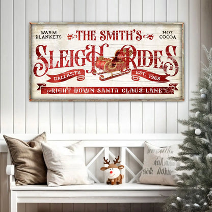 Framed Christmas wall sign above bench, featuring red sleigh ride typography
