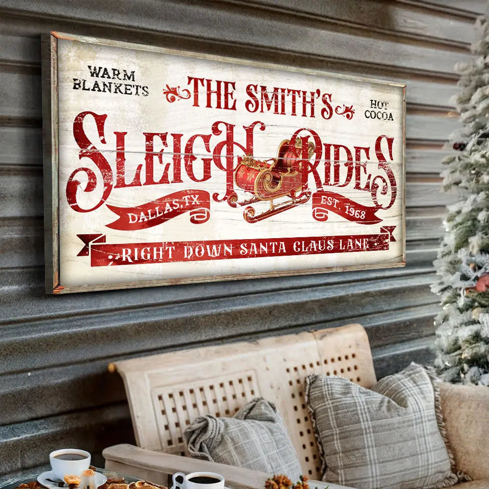 Framed sleigh ride Christmas wall art in vintage red lettering, angled view