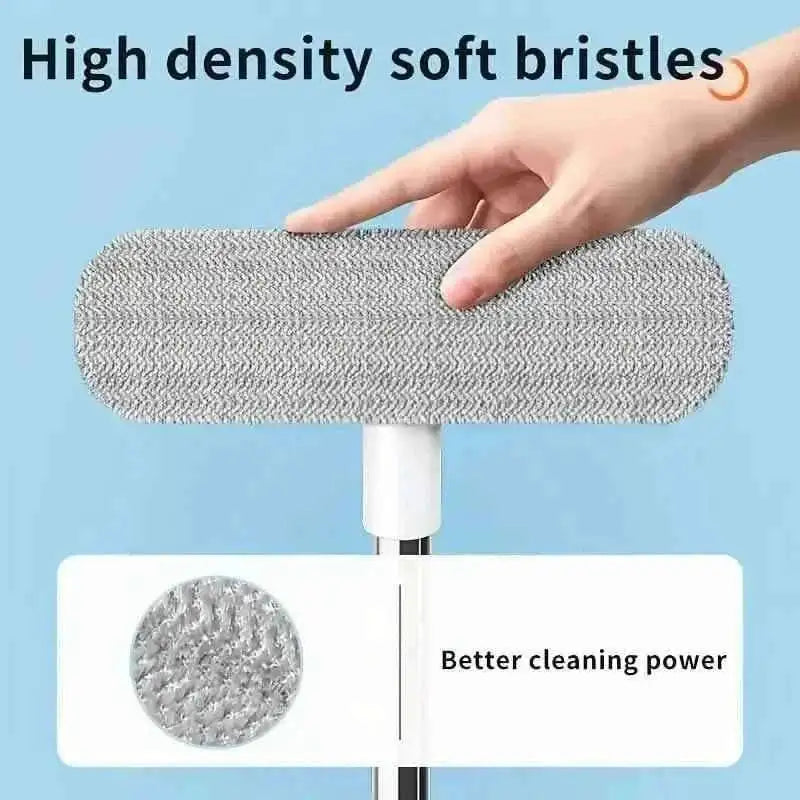 Gray bristle cleaning pad on white brush head with extendable metal handle