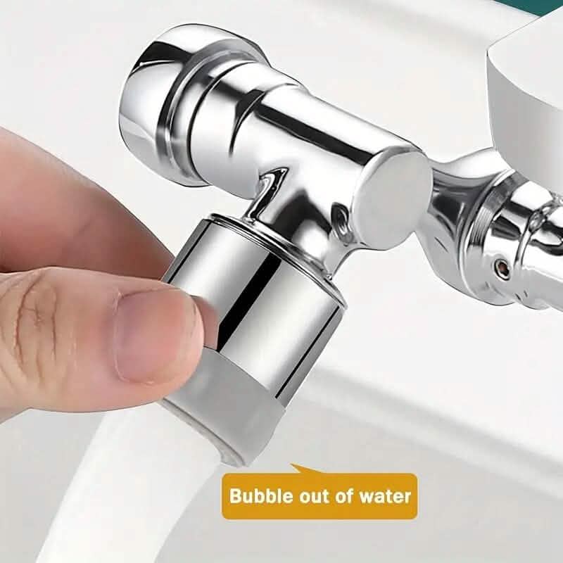 Chrome faucet extender attachment shown being connected by hand