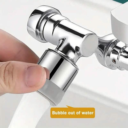 Chrome faucet extender attachment shown being connected by hand