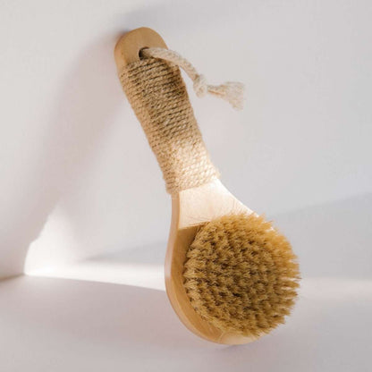 Wood and hemp-wound handle dry brush with round bristle head and hanging loop