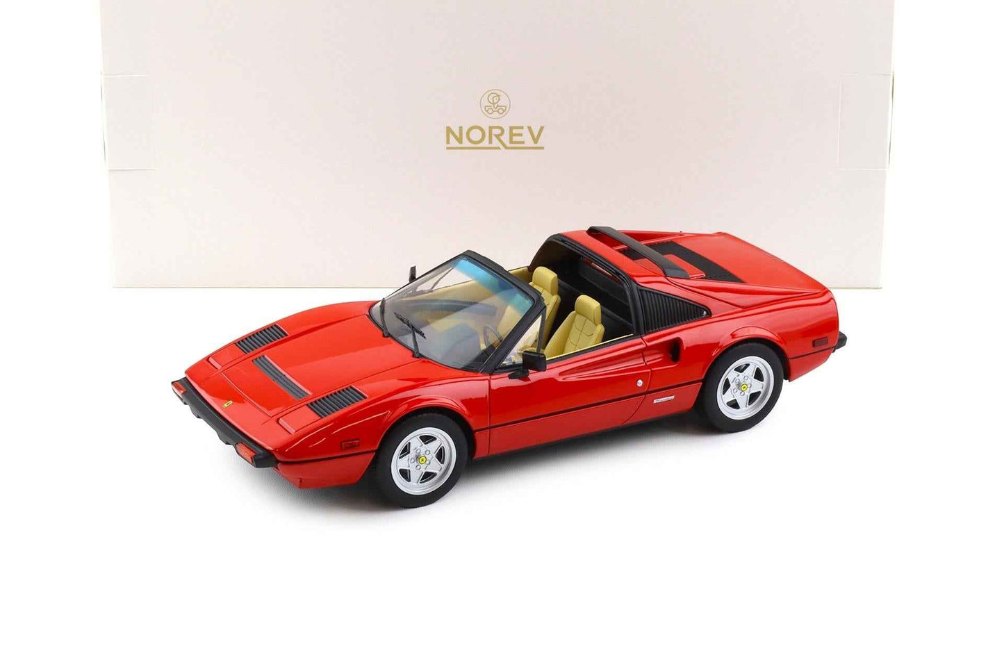 Norev red 1:18 die-cast Ferrari 308 GTS model car with black stripes and open wheels