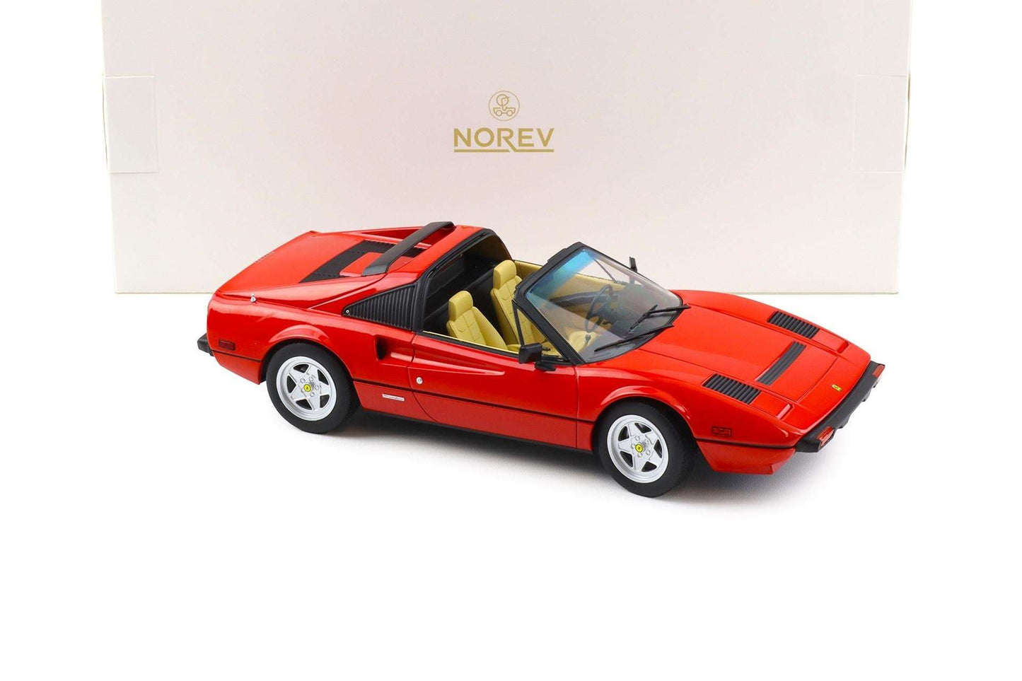 Norev red 1:18 die-cast sports car model with black hood stripes, side front view