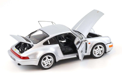 Silver Porsche 911 die-cast model car, doors open with hood up, four-spoke wheels