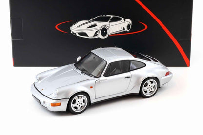 Silver Porsche 911 die-cast model car, front three-quarter view with four-spoke wheels