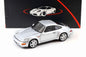 Silver Porsche 911 die-cast model car, front three-quarter view with four-spoke wheels