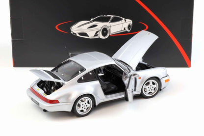 Silver Porsche 911 die-cast model car, front-left door open and hood raised, four-spoke wheels