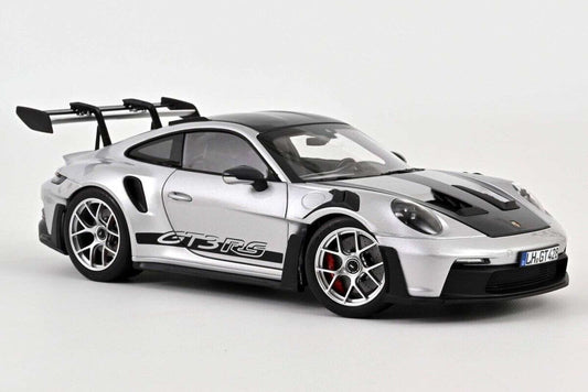 Silver 1:18 die-cast sports car model with black aero, front 3/4 view and large rear wing