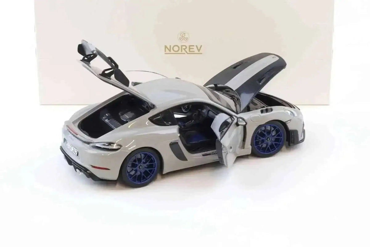 Norev 2023 Porsche 718 Cayman GT4 RS w/ Weissach Package Chalk w/ Blue Wheels 1:18 Cartsfy Inc.