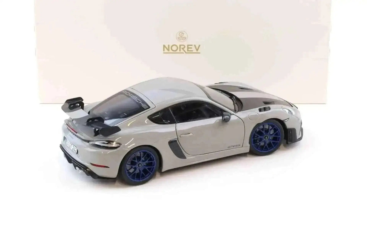 Norev 2023 Porsche 718 Cayman GT4 RS w/ Weissach Package Chalk w/ Blue Wheels 1:18 Cartsfy Inc.