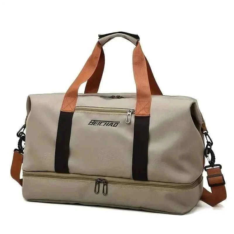 Nylon duffel bag in beige with black stripe and tan handles, front zip pocket.