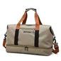 Beige nylon duffel bag with black stripe, top handle, and front zip pocket