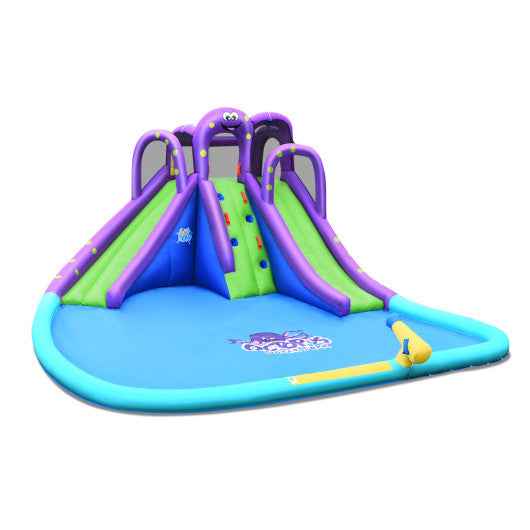 Purple inflatable bounce house with slide, splash pool base, and blower setup