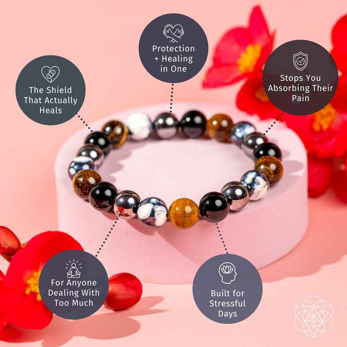 Beaded healing bracelet with black and silver beads and brown accent stones