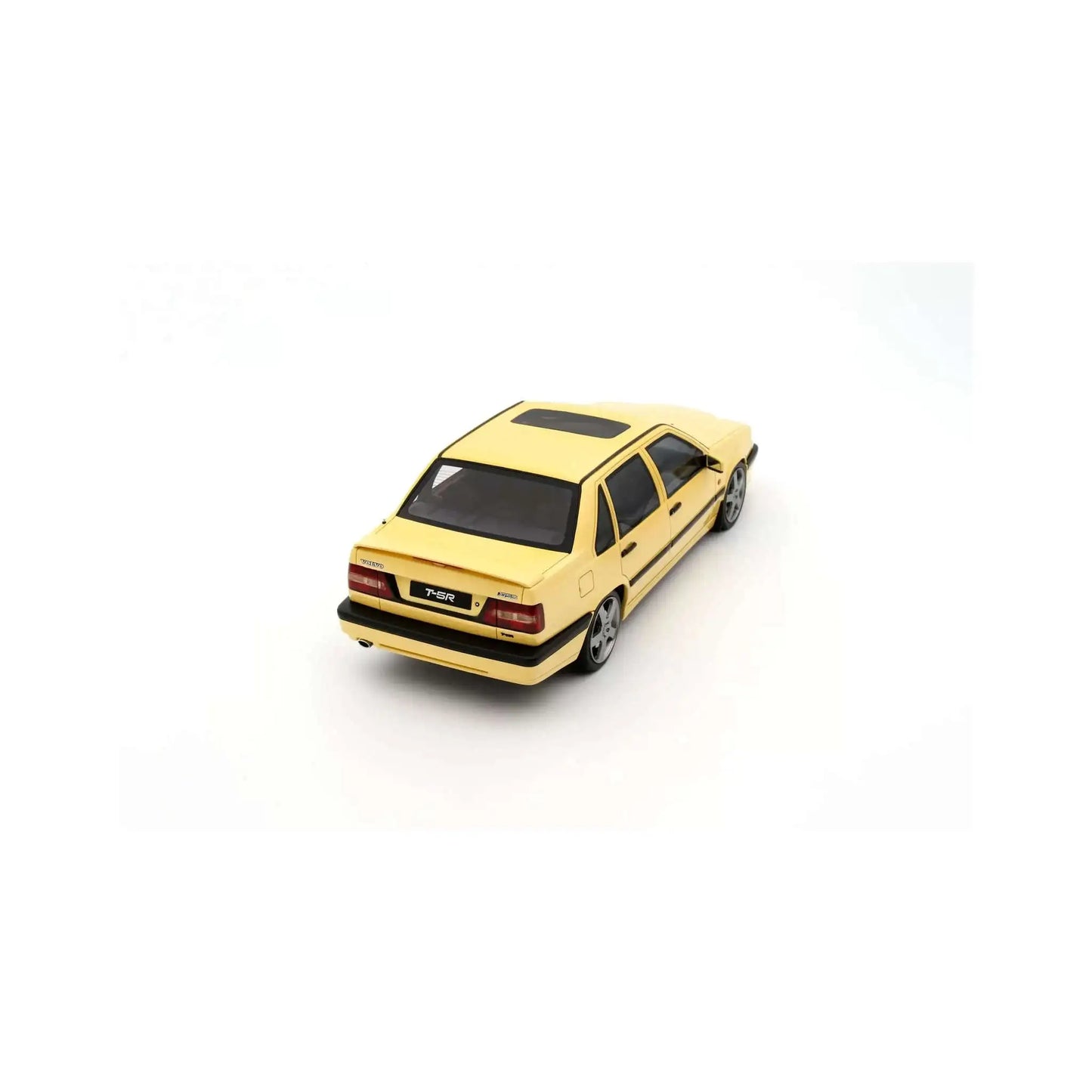 Cream yellow 1:18 Volvo 850 T5R station wagon model, top-right three-quarter view