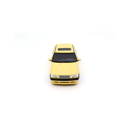 Cream yellow 1:18 die-cast sedan model car, front view with headlights