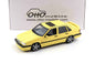 Cream yellow 1:18 Volvo 850 T5R station wagon model, front-left three-quarter view