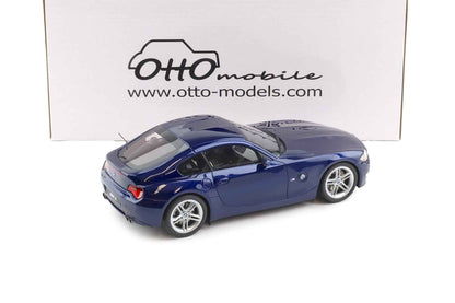 Blue metallic BMW Z4 M coupe die-cast model, rear three-quarter view, silver wheels