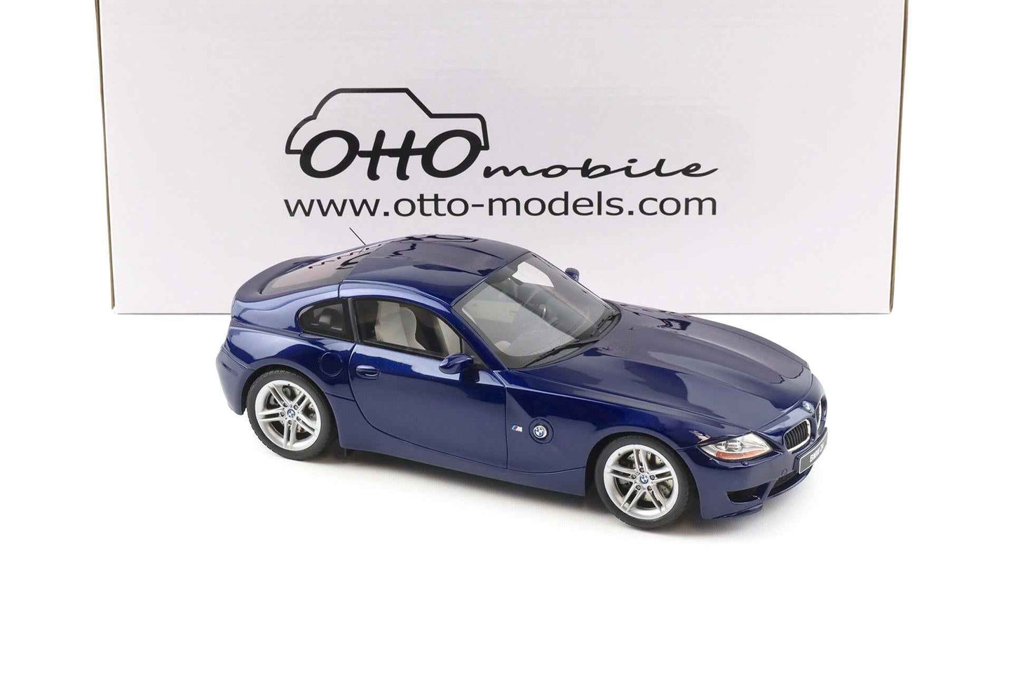 Blue metallic BMW Z4 M coupe die-cast model, side view, silver alloy wheels