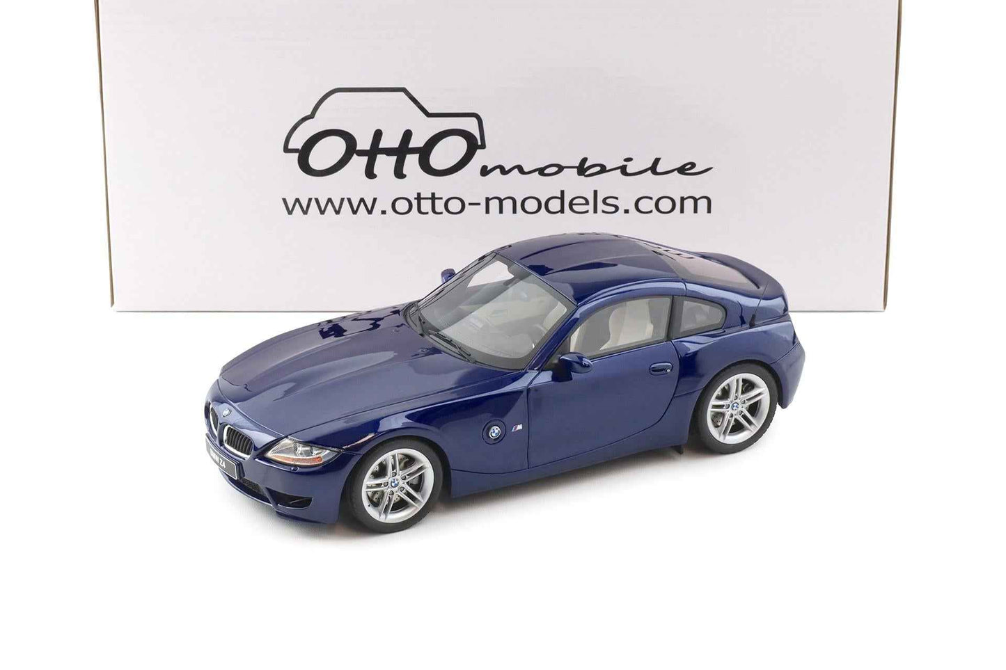 Blue metallic BMW Z4 M coupe die-cast model, front view, silver alloy wheels