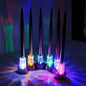 Outdoor solar LED garden lights, glowing multicolor bulbs on spike stakes