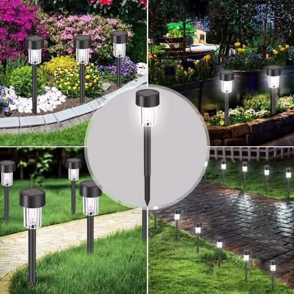 Outdoor solar LED garden light, black top and clear bulb with silver spike stake