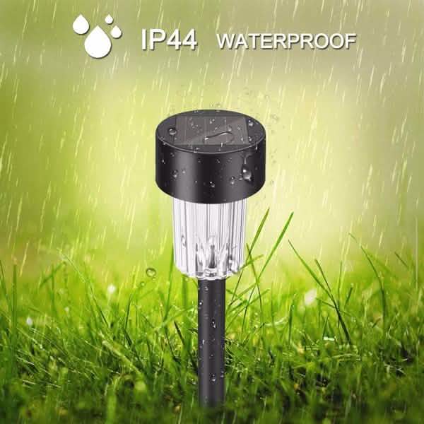 Outdoor solar LED garden stake light, black base with clear cylinder for outdoor use