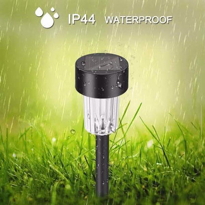 Outdoor solar LED garden stake light, black base with clear cylinder for outdoor use