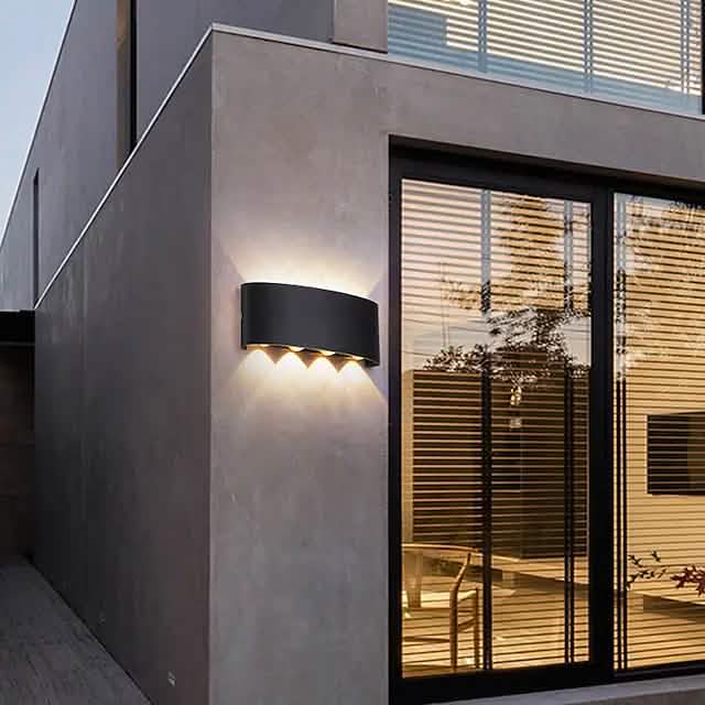 Black outdoor waterproof wall light with scalloped LED glow