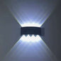 Outdoor waterproof wall light, black rectangular fixture with cool white two-way glow
