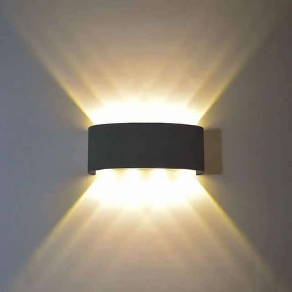 Outdoor waterproof wall light, dark rectangular fixture with warm white two-way light
