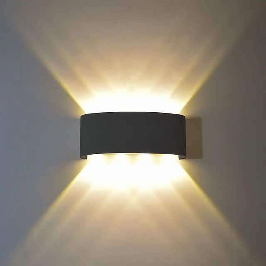 Outdoor waterproof wall light, dark rectangular fixture with warm white two-way light