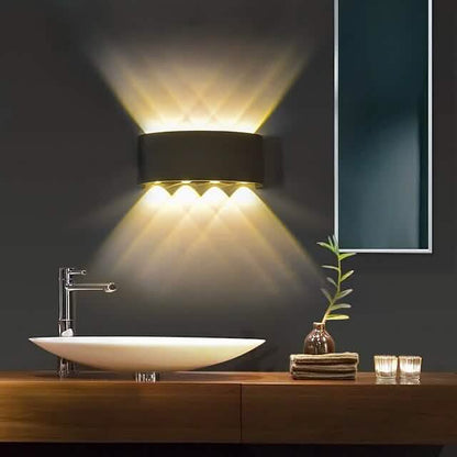 Black outdoor waterproof wall light with warm LED glow
