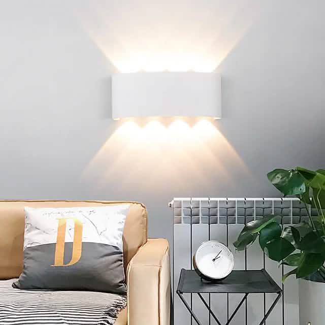 Black outdoor waterproof wall light with warm LED glow