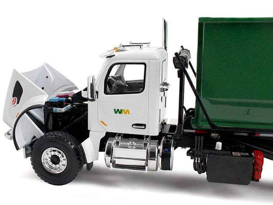 Diecast refuse truck model with white cab and green container, exposed front and hinge details