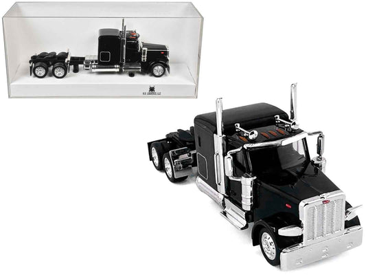 Black HO scale plastic semi truck model with 72-inch sleeper, chrome details