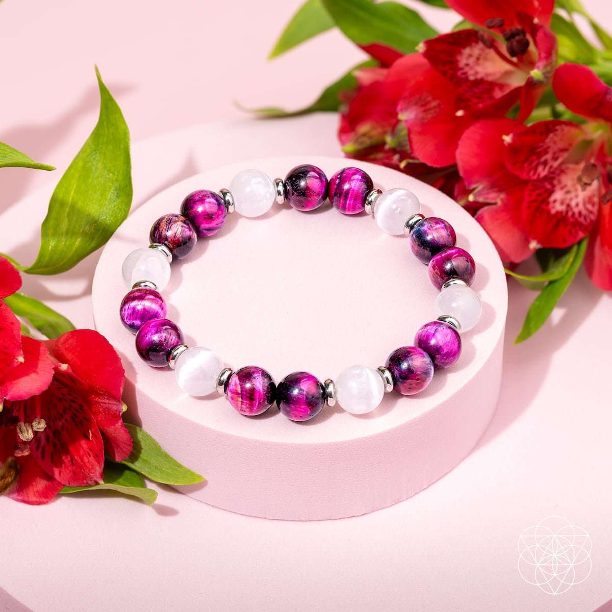 Beaded gemstone bracelet with magenta beads and white stone beads.
