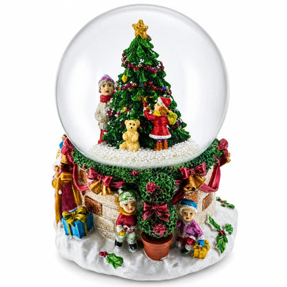 Joyful Children Adorning Christmas Tree: Musical Water Snow Globe