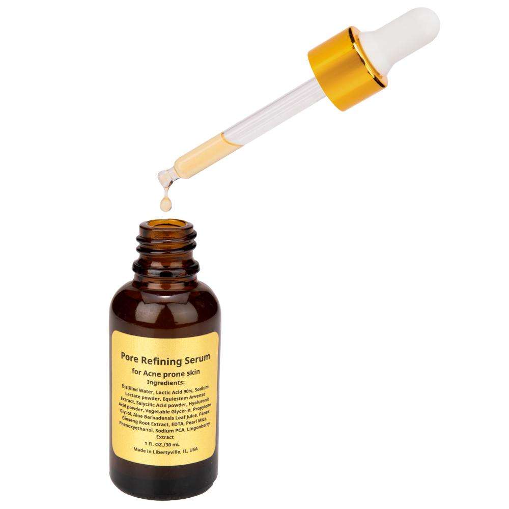 Pore refining serum bottle with gold dropper and amber liquid