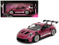 Porsche 911 GT3 RS diecast model car, magenta with white racing stripes and rear wing